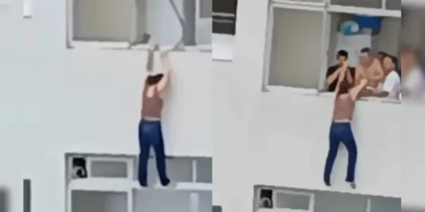 Assustador! Mulher escorrega e fica pendurada em prédio